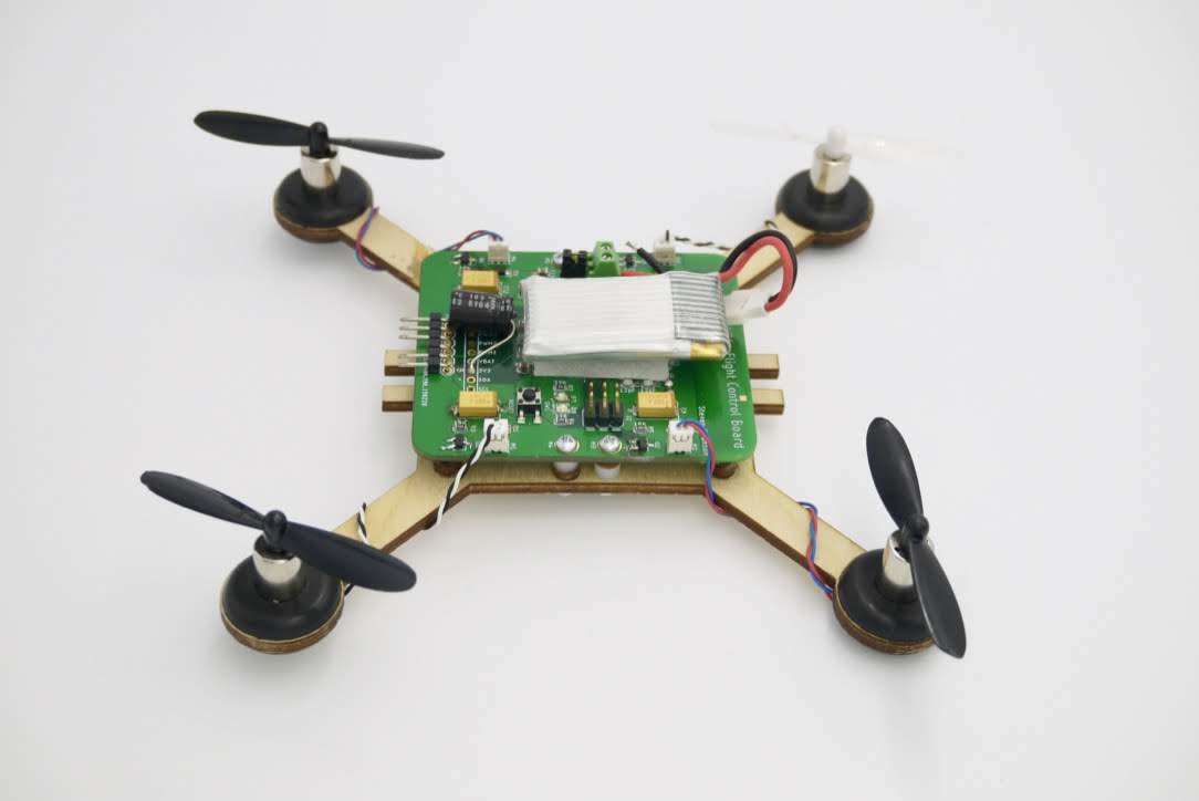 Test bed quadcopter, pcb on wooden frame.